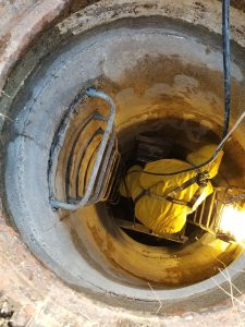 A contractor performs maintenance hole rehabilitation via injection grouting to eliminate inflow and infiltration